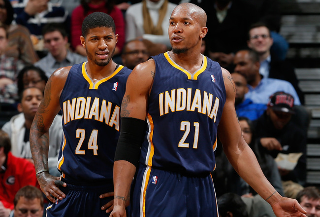 hi-res-461440703-paul-george-and-david-west-of-the-indiana-pacers-react_crop_650x440
